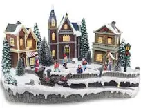 Skating Christmas Village | Animated Pre-Lit Musical Winter Snow Village with 4 Moving Skaters | Perfect Addition to Your Christmas Indoor Decorations