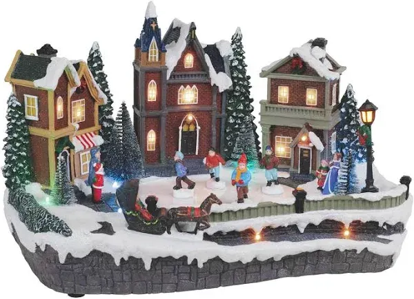 The Holiday Aisle Animated Pre-Lit Musical Snow Skating Christmas Village