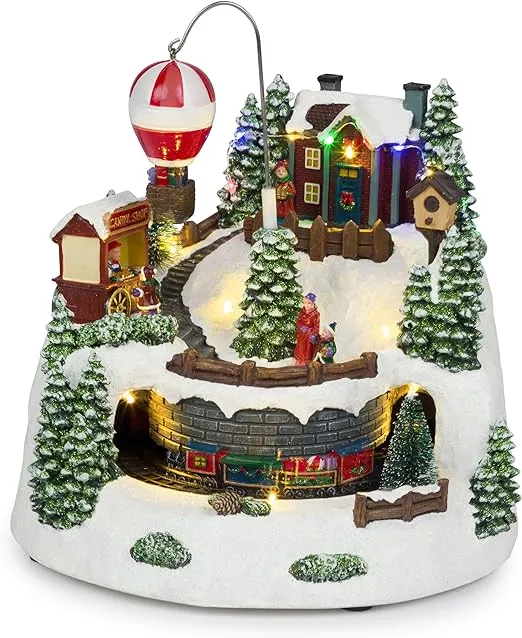 Alpine Corporation Animated Christmas Ski Resort Holiday Tabletop Decor with 12 Warm White LED Lights and Moving Skier Figurines, 12" L x 8" W x 9" H